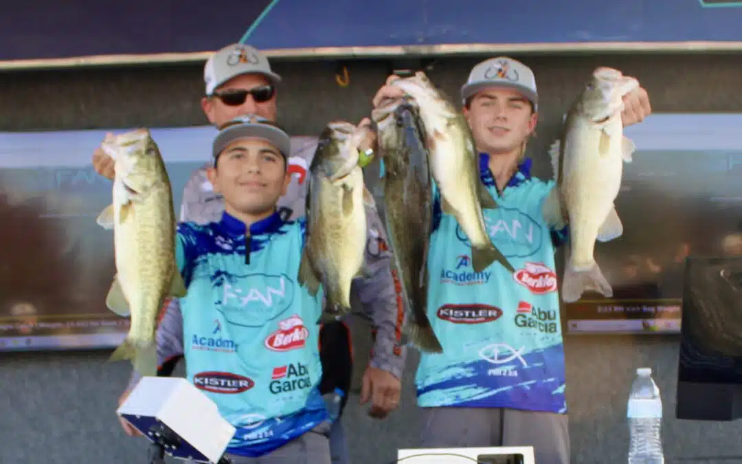 Youth anglers proudly display their catch.