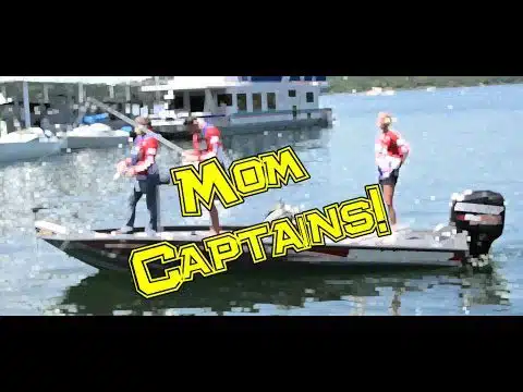 Here's an alt tag for the image: Mom captains fishing boat.