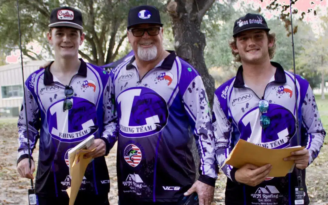 Three fishing team members in purple jerseys